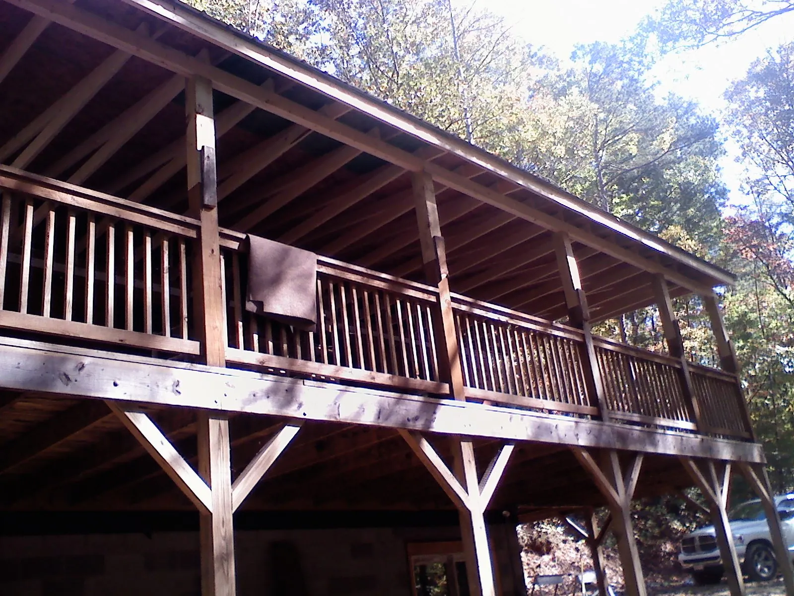 Timber framing under a new elevated porch and deck — Roof Leak Repair in Quincy by Roofing Brothers
